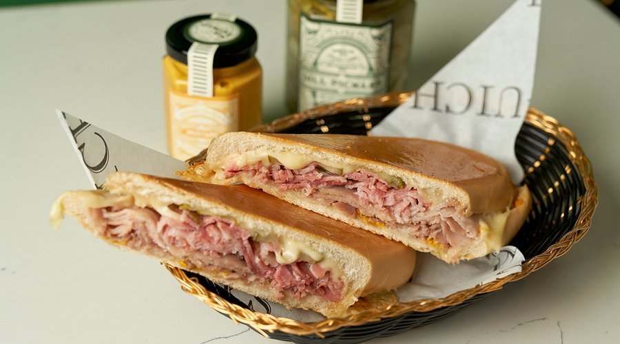 Sanguich de Miami signature dishes Cuban Sandwich
Pan con Bistec
Cubano and De Miami